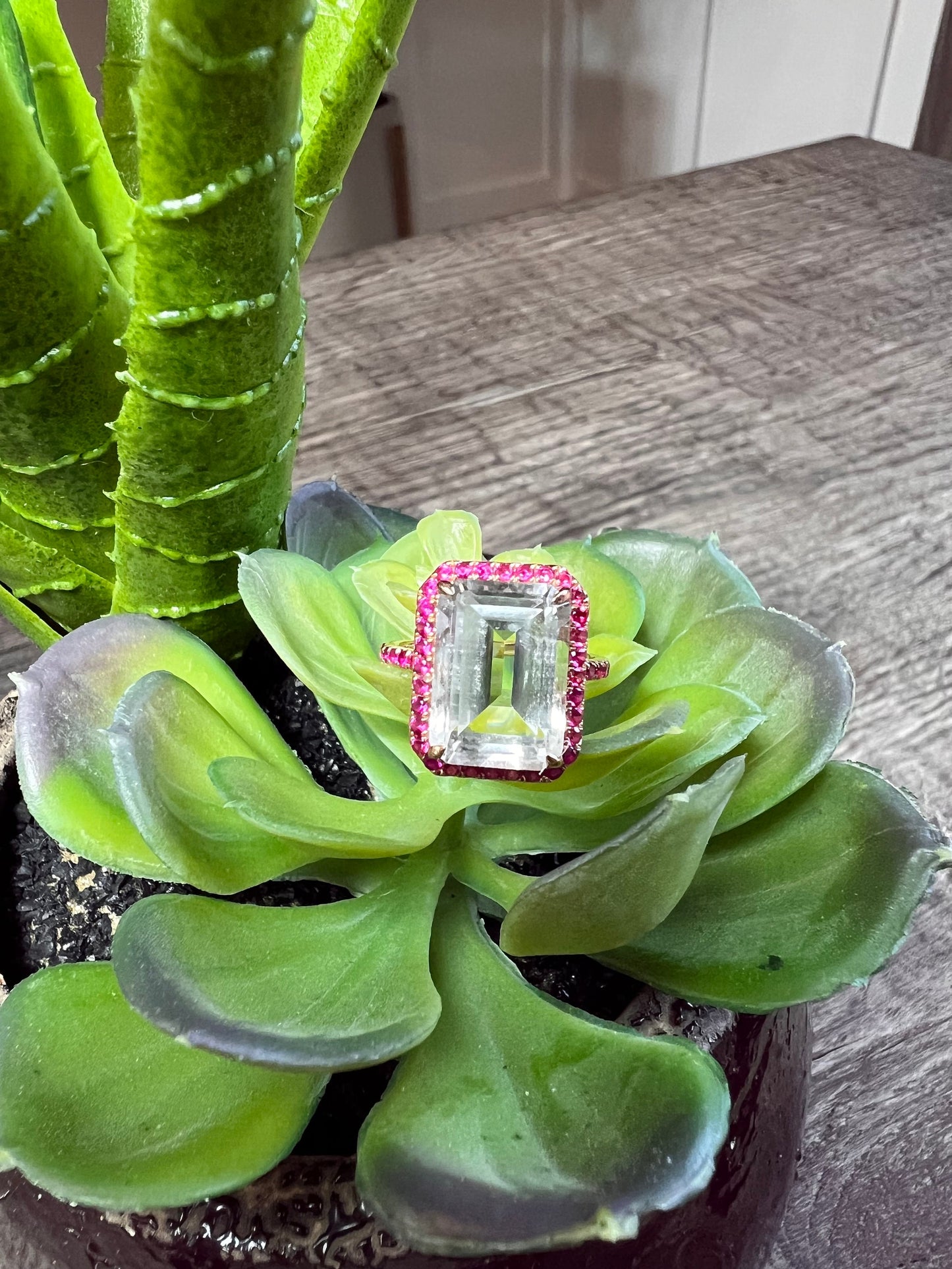 Emerald cut White Quartz with a ruby Ruby halo set in 14k rose gold by EFFY