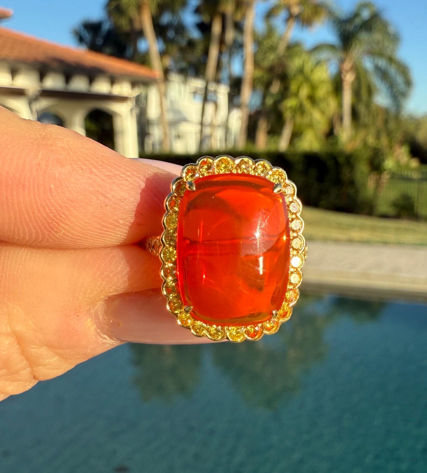 Stunning Fire Opal with Yellow Diamond Halo in 18K gold