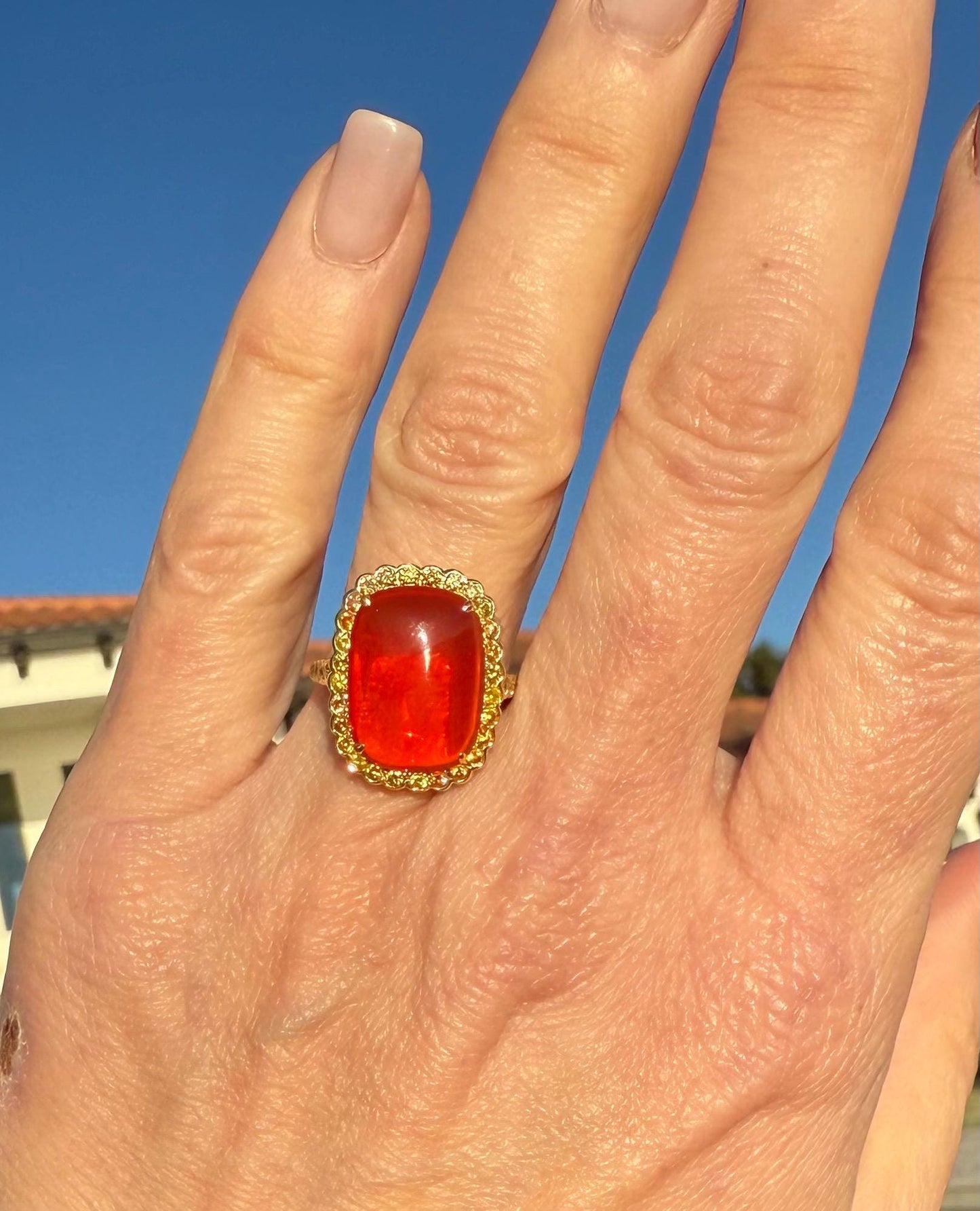 Stunning Fire Opal with Yellow Diamond Halo in 18K gold
