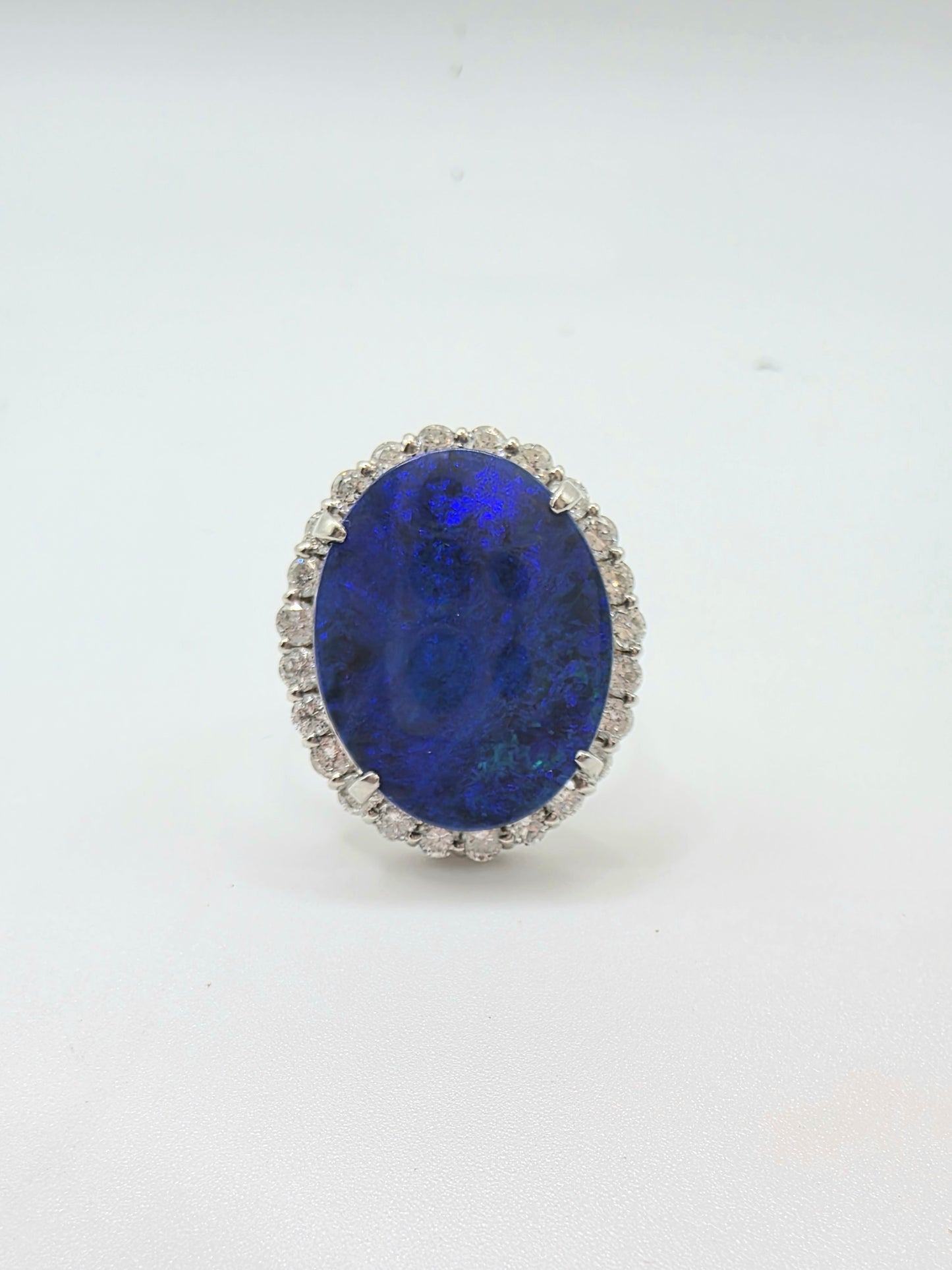 8ct Australian Opal RIng with Diamond Halo set in Platinum