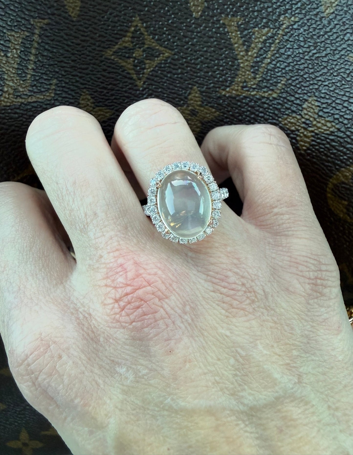 8ct Moonstone and Diamond Halo ring