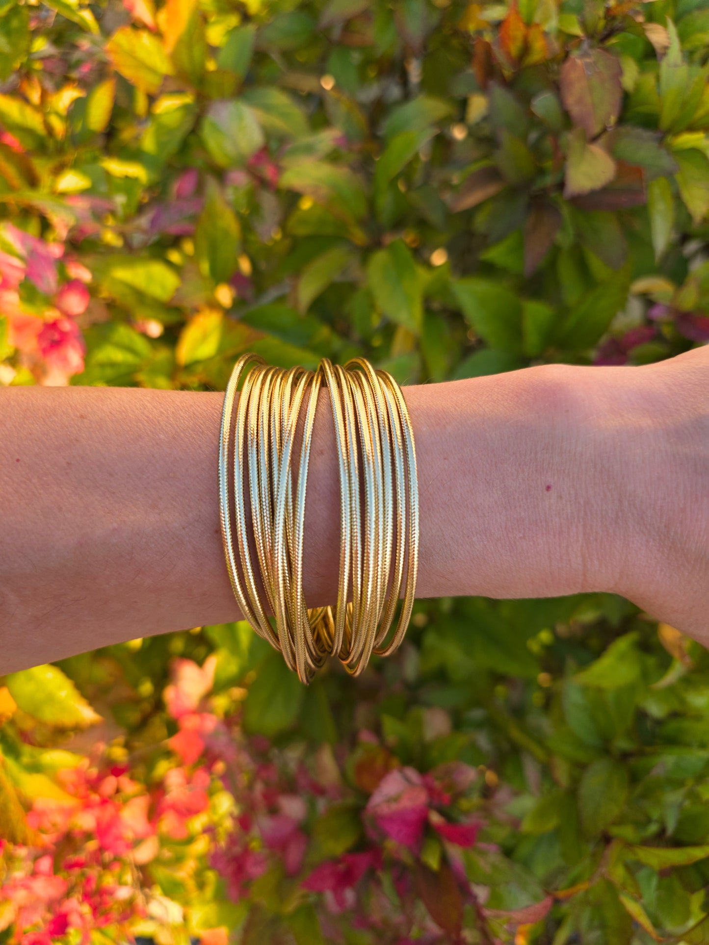 A designer 14K Multi-strand Bangle