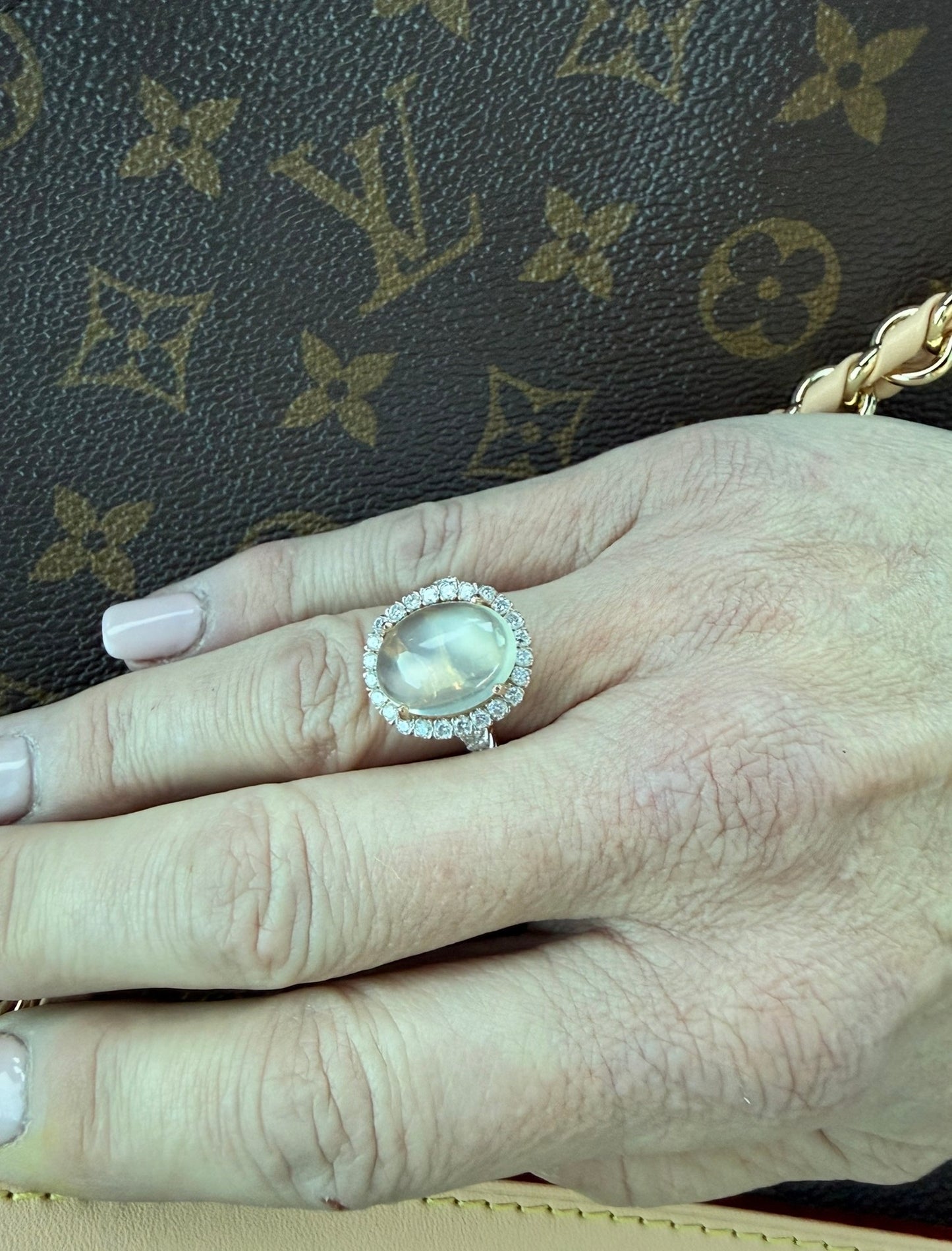 8ct Moonstone and Diamond Halo ring