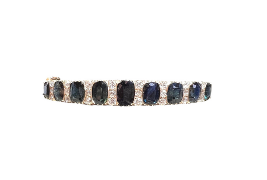 A superb quality Antique /Victorian Style Blue Sapphire and Diamond Bangle Bracelet . Old cut diamonds