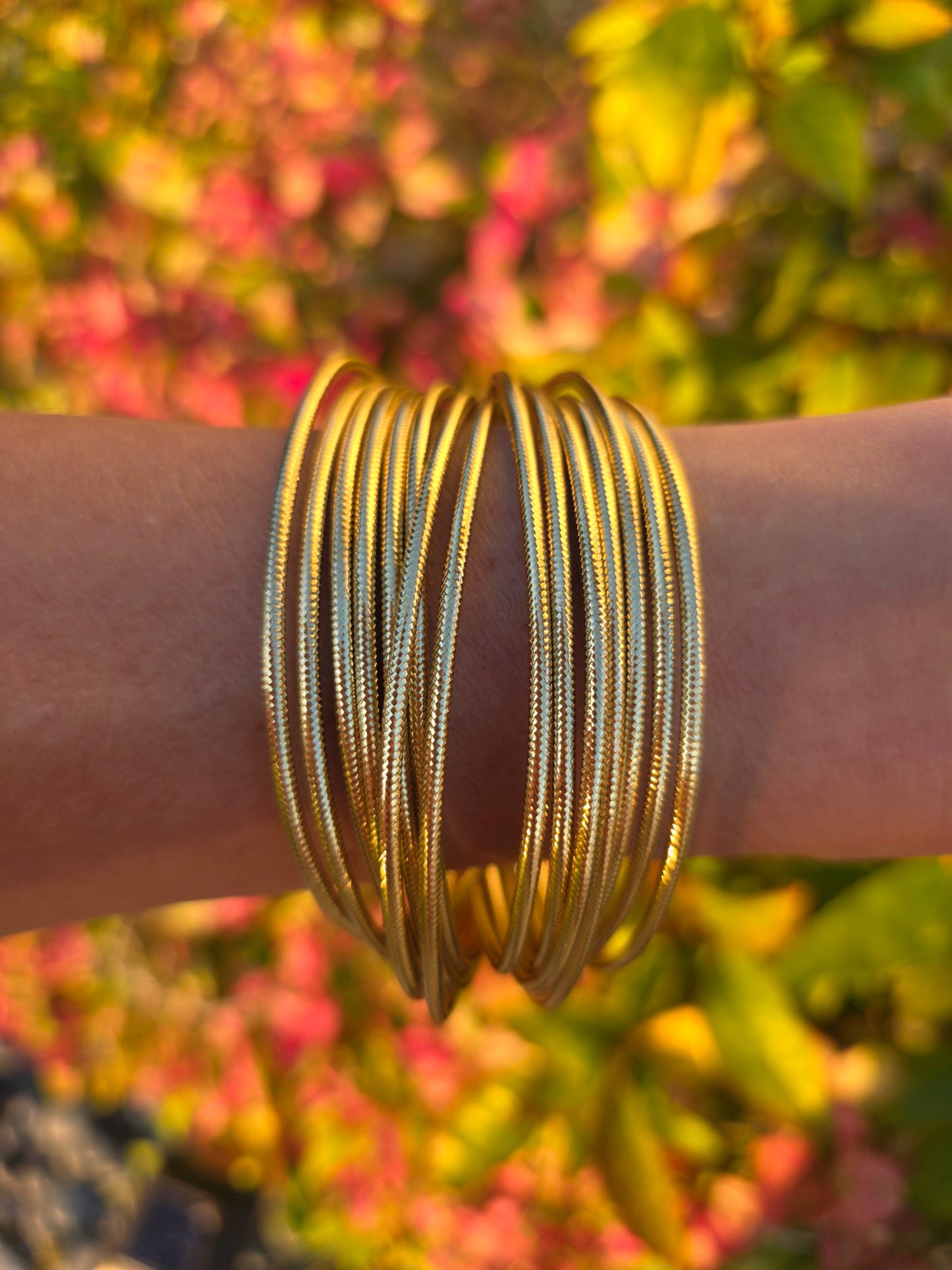A designer 14K Multi-strand Bangle