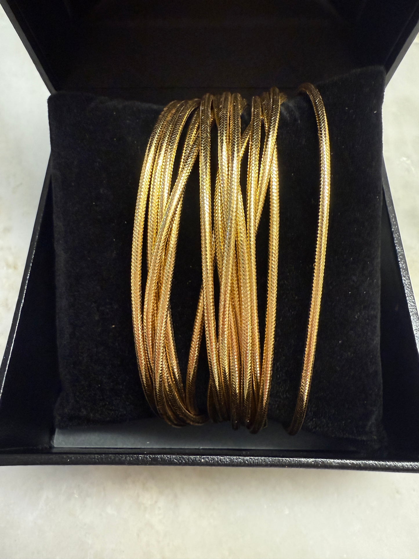 A designer 14K Multi-strand Bangle