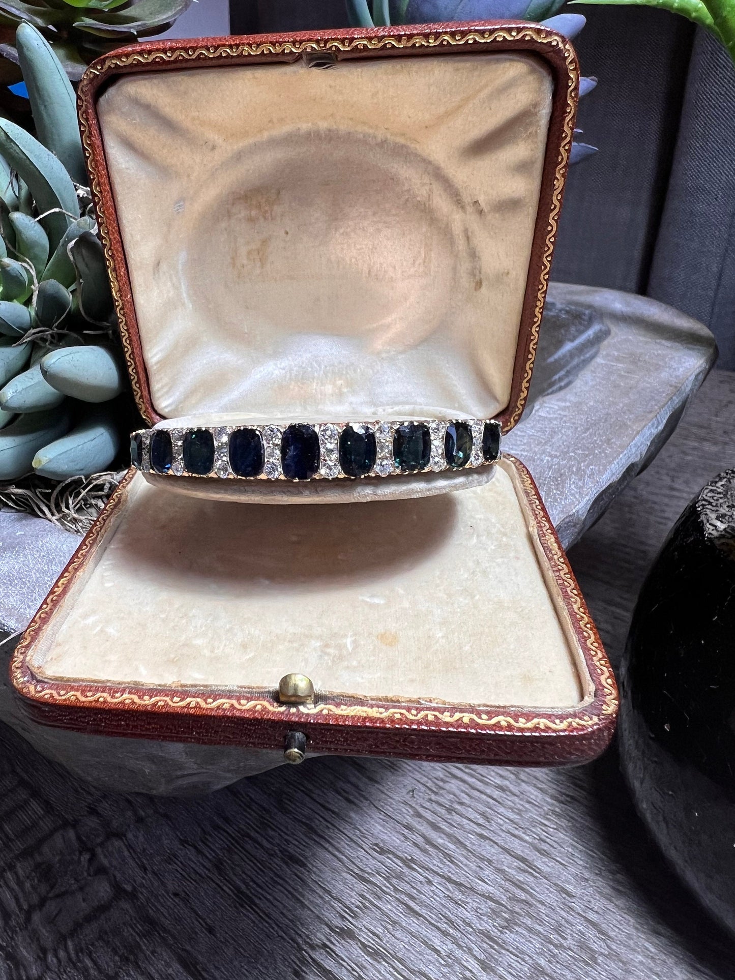 A superb quality Antique /Victorian Style Blue Sapphire and Diamond Bangle Bracelet . Old cut diamonds